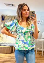 Load image into Gallery viewer, Green, blue and white top with short puff sleeves, sweetheart neckline, adjusts under the busts.
