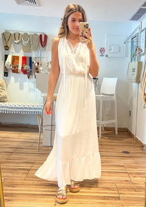White maxi dress with elastic waist band, lining until knee, ties in the front.
