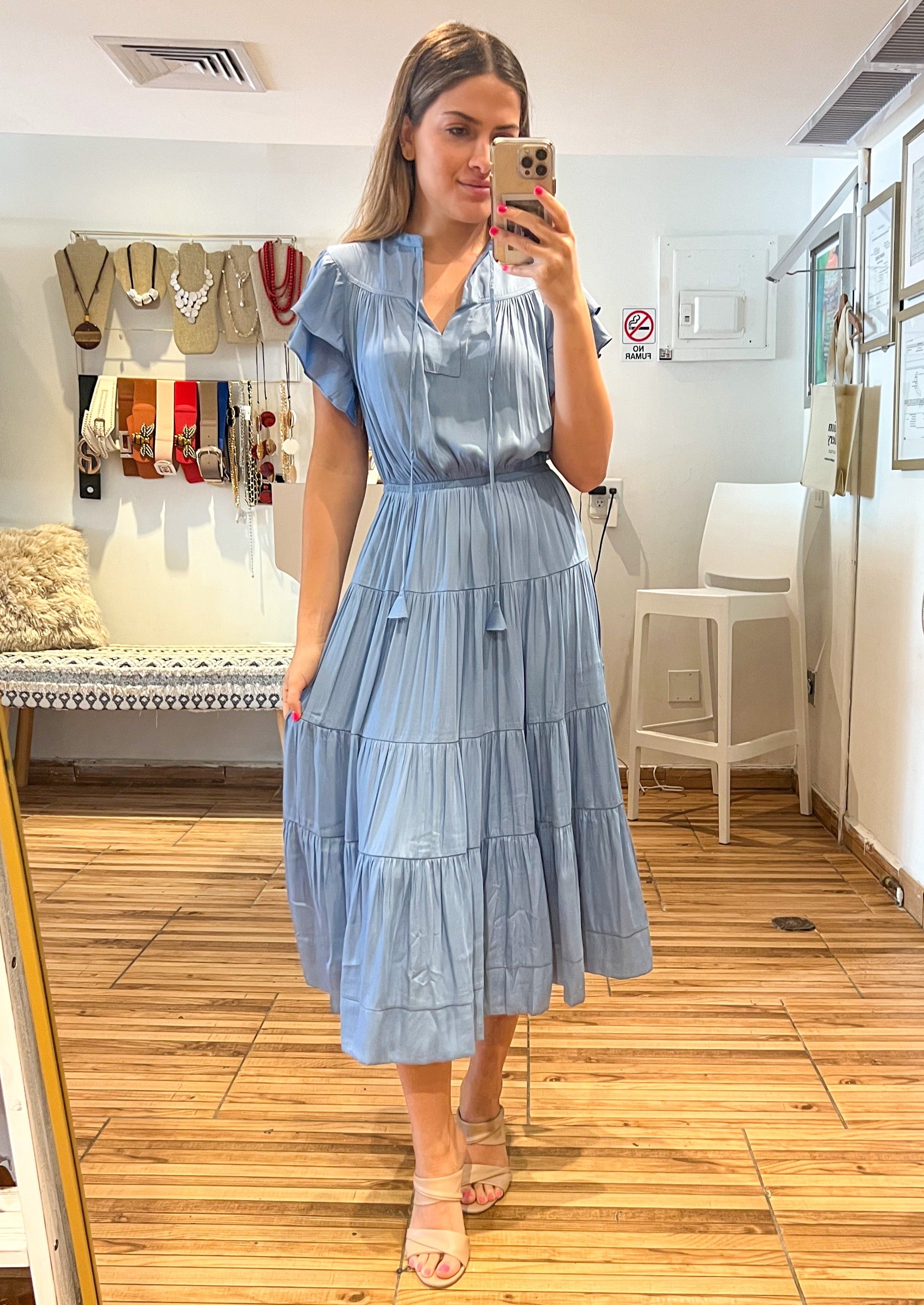 Light dusty blue flutter short sleeves, split neck with tie, con shaped trim tiered midi dress.