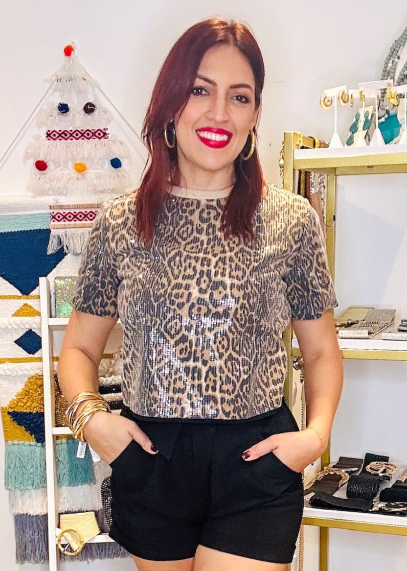 Taupe leopard shoulder pad sequins top.
