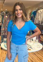Load image into Gallery viewer, Hawaiian blue mutli ribbed wrap knit top. So comfortable and perfect for jeans.
