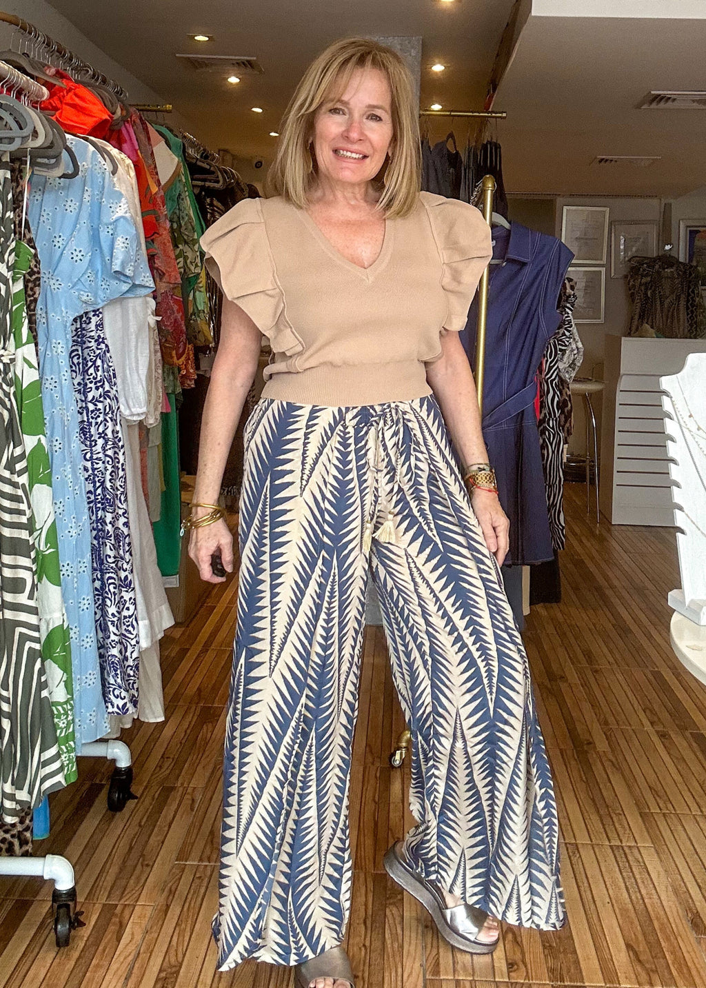 Blue and cream high waisted loose fitting pants with elastic waist band.