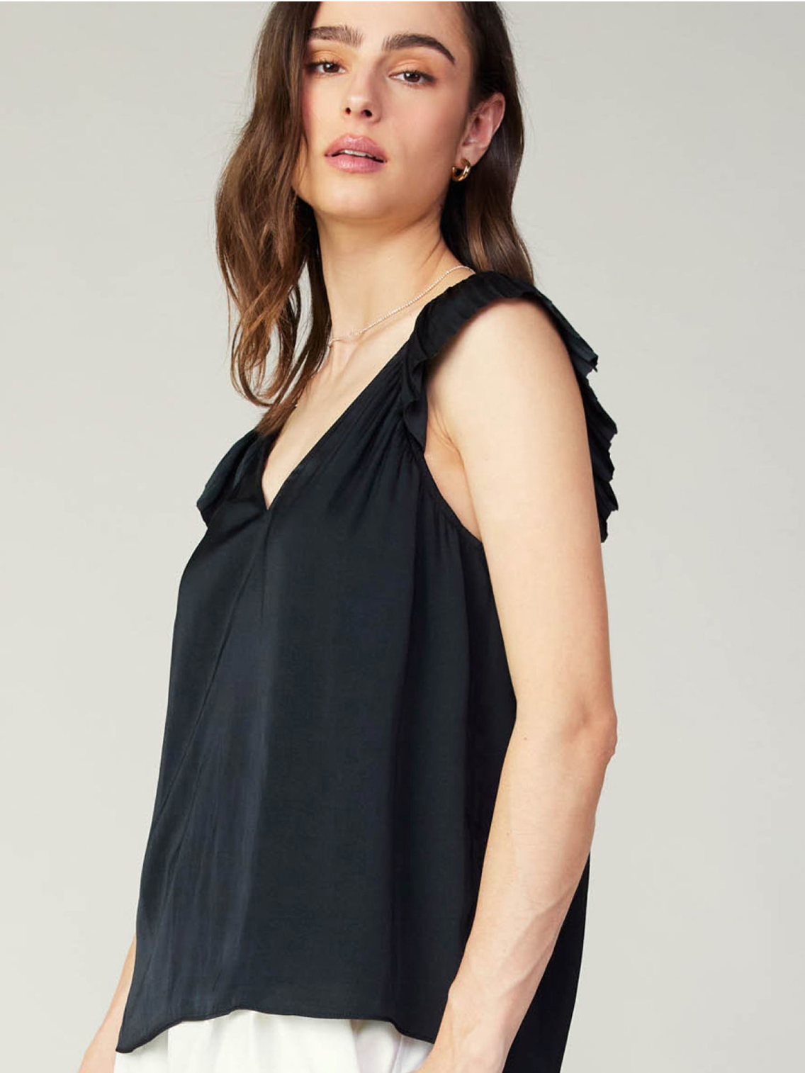Black sweetheart neck pleated ruffle sleeve top.