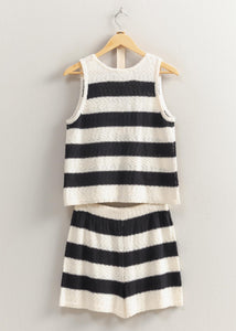 The Sun Is Out, So Slip Into This Set And Head Out. Covered In A Striped Pattern, The Sweater Top Has A V-Neckline With A Sleeveless Bodice That Has A Relaxed Fit. The Matching Shorts Have A Drawstring Waist And A Flowy Silhouette.