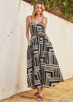 Load image into Gallery viewer, Printed maxi dress with flared hem. Dramatic a-line. Detachable self tie belt.
