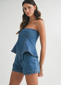 Denim fit and flare denim strapless tube top and matching front button shorts. Top has back exposed zipper.