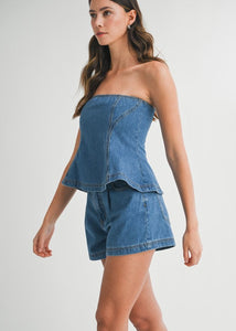 Denim fit and flare denim strapless tube top and matching front button shorts. Top has back exposed zipper.