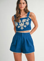 Load image into Gallery viewer, Solid sleeveless floral embroidered detail crop top with back button closure and matching shorts with front button set. Lining.
