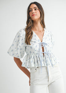 Puff short sleeve ditzy floral printed front bow tie crop peplum top.