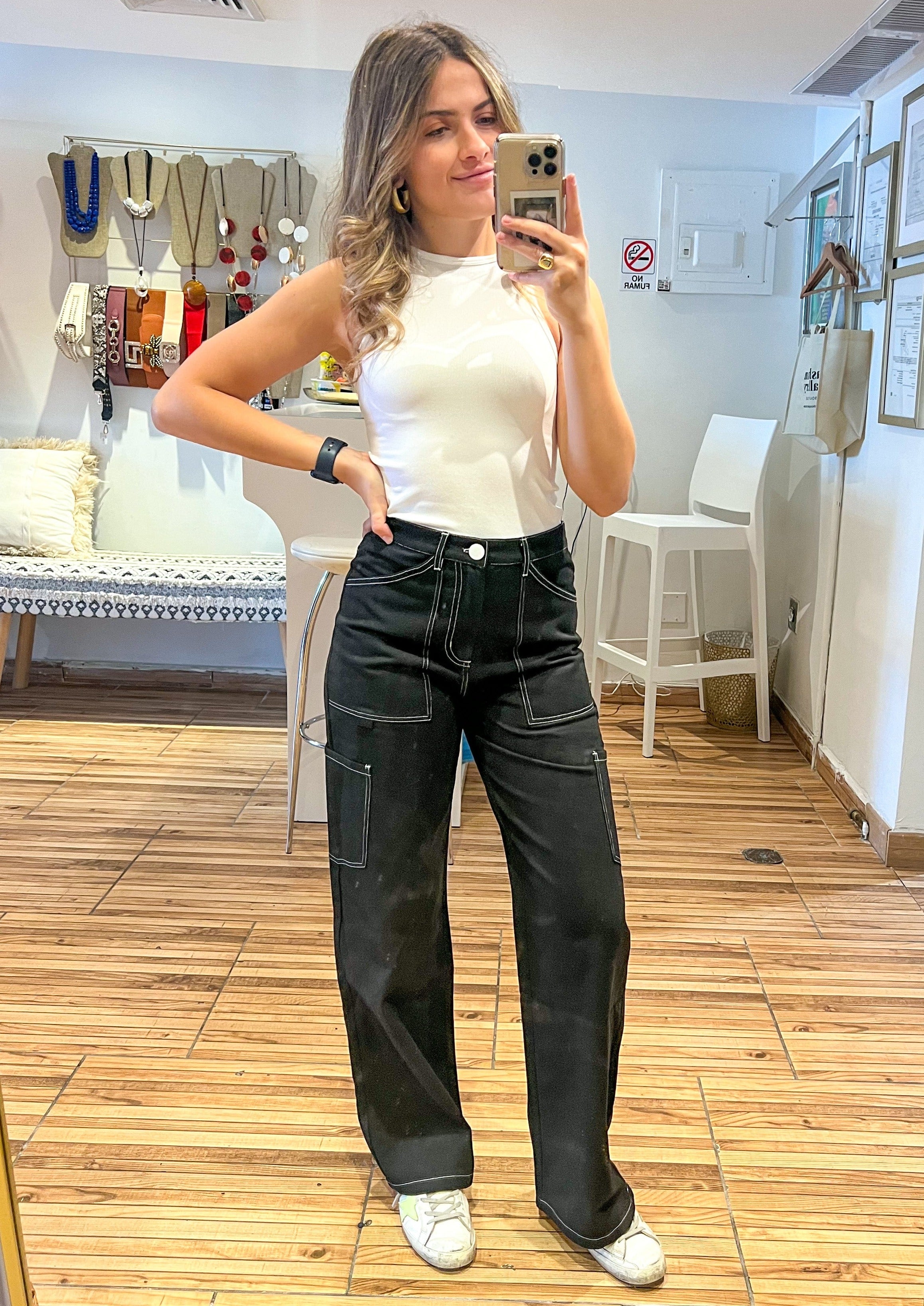High waisted straight leg cargo pants with side pockets and back pockets.