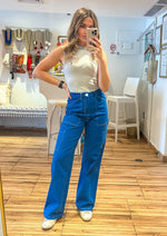 Load image into Gallery viewer, High waisted straight leg cargo pants with side pockets and back pockets.
